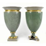 ROYAL COPENHAGEN; a pair of crackle glazed urns, height 37cm (af).Additional InformationOn one of