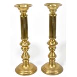 A pair of brass cluster column candlesticks, height 45cm.