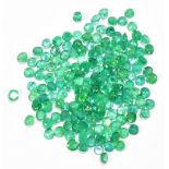 EMERALDS; a group of round facet cut stones weighing 30ct, each 3.5mm.