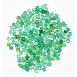 EMERALDS; a group of round facet cut stones weighing 21.89ct, each 3mm.