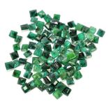 EMERALDS; a group of square facet cut stones totalling 54.56ct, each 5mm.