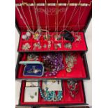 A quantity of costume jewellery, including brooches, earrings, simulated beads, rings etc.