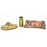 Two Art Nouveau style desk stands, including a shaped rectangular copper example with floral