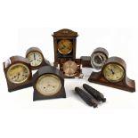 A group of mantel clocks including three oak examples (5).