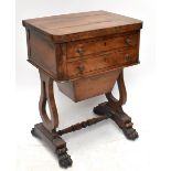 A William IV rosewood games/work table, with fold over top above two drawers and silks drawer,