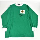 GEORGE BEST; a Toffs long sleeve Northern Ireland shirt, signed to the front and inscribed 'best