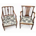 Two early 19th century mahogany open elbow dining chairs, on tapered legs (2).