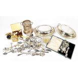 A collection of plated items and flatware, including two entrée dishes and covers (Qty).