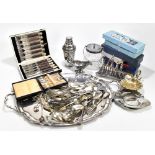 An assortment of silver plate including a large twin handled butlers' tray, a cocktail shaker,