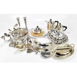 A collection of 19th century and later silver plated wares, including a pair of entrée dishes and