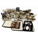 A large collection of electroplated items including sauce boats, jugs, teapots, etc.