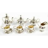 A silver plated novelty ten piece tea service in the Queen Anne style, tallest item 6.5cm.