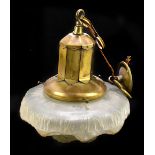 An early 20th century French brass and opaque glass ceiling light, the glass moulded as a large