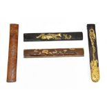 A group of four Japanese Meiji period Kozuka bronze handles, three with gilt heightened decoration