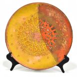 RAGNA SPERSCHNEIDER (1928-2003); a large base metal and enamel decorated charger of abstract design,