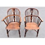 Two 18th century elm seated low back Windsor elbow chairs with yew wood backs above crinoline