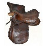 A German military brown leather saddle.