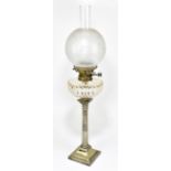 A late 19th century electroplated Corinthian column oil lamp, with a frosted glass shade, height