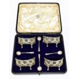 GEORGE NATHAN & RIDLEY HAYES; a cased set of four Edward VII hallmarked silver open salts of oval