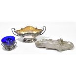 WMF; an Art Nouveau centrepiece with shaped glass liner, twin handles and spreading oval foot, an