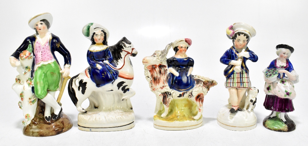 STAFFORDSHIRE; four 19th century figures including two similar examples of girl seated on a goat and