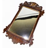 A Georgian style mahogany fretwork wall mirror with eagle surmount, 85 x 50cm.