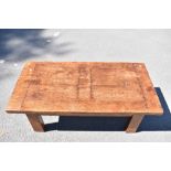 A modern rustic oak coffee table of rectangular form on block feet, width 120cm, depth 60cm,