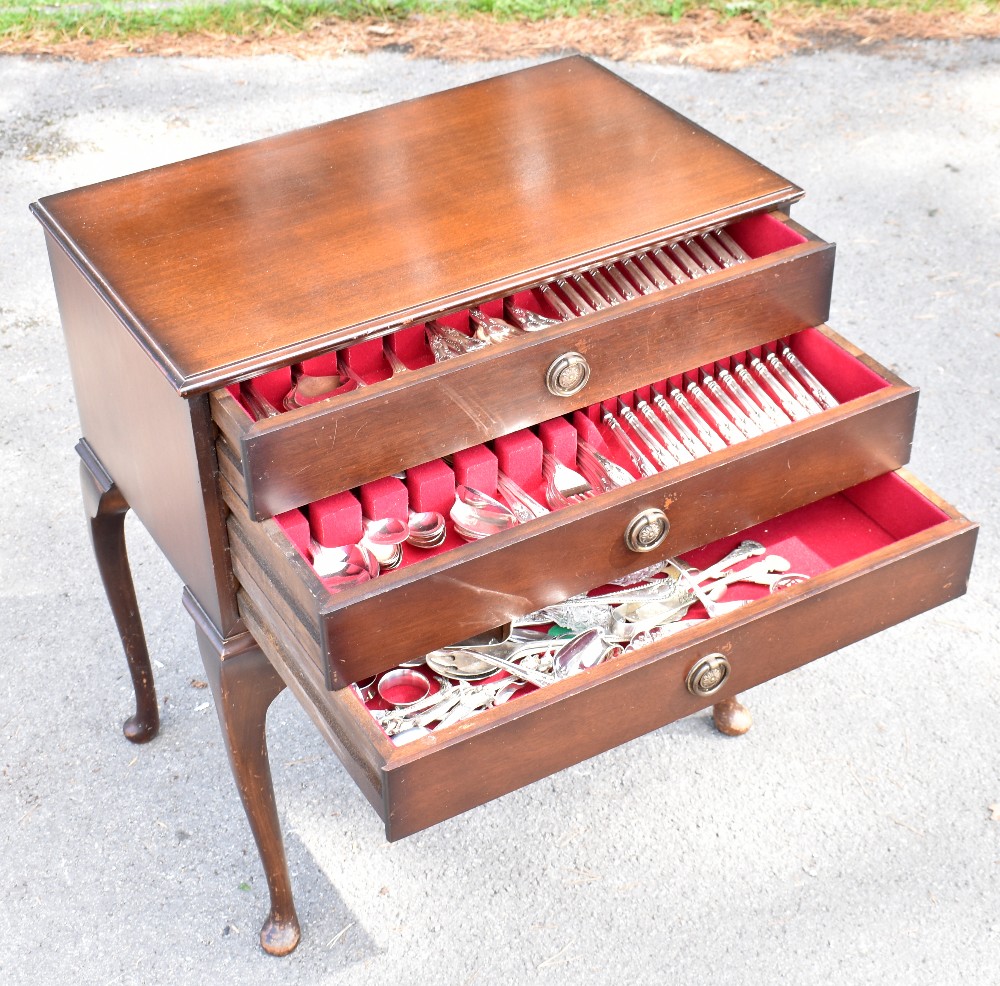 VINERS; a canteen of silver plated King's pattern cutlery, in a three drawer chest with other plated