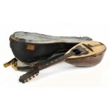 An Italian mandolin with label for Giov. De Meglio & F, cased.