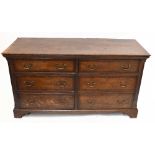 An 18th century oak mule chest, with an arrangement of six drawers on bracket feet, width 151cm,