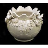 BELLEEK; a bulbous jardinière with floral encrusted detail and three applied birds to the top of the