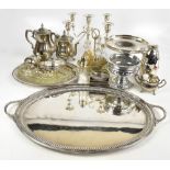 A collection of electroplated items including a candelabrum, a large twin handled tray, a cocktail