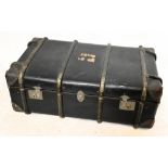 THE NATIONAL CHANNEL; a vintage travelling trunk, length 93cm, with a pair of cast iron andirons (