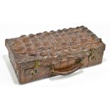 An Edwardian crocodile skin case with twin brass locks, width 46cm.