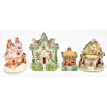 STAFFORDSHIRE; four 19th century cottages/pastille burners/money box, height of largest example 13cm