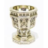 HENRY WILKINSON; a late Victorian hallmarked silver novelty open salt, modelled as a church font