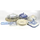 A collection of 19th century and later blue and white ceramics including tureens, meat drainers,