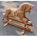 WOOD PERFECT; a modern handmade rocking horse, length 130cm.