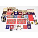 A group of coins, predominantly commemorative crowns, also a National service medal.