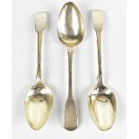 Three hallmarked silver Fiddle pattern serving spoons, indistinctly stamped to the reverse, 22cm,