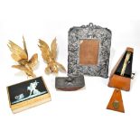 A small group of collectors' items including a metronome, embossed silver plated mirror, pair of