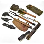 A selection of WWII and later military tools and weapons, including two pairs of wire cutters, two