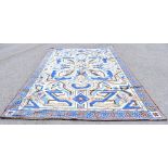 An Art Deco design hand embroidered tapestry carpet, dated 1976 and initialled AB, decorated with an