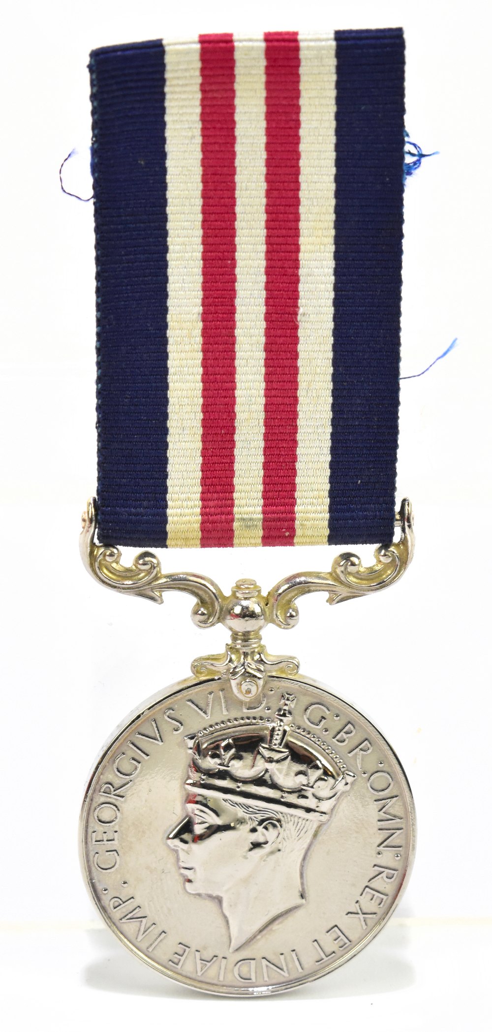 An unnamed George VI military medal.