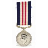 An unnamed George VI military medal.