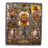 An early 17th century German stained glass and leaded panel decorated with two knights, centred with