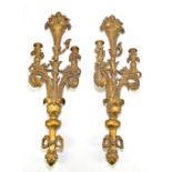 A pair of gilt resin wall hanging candleholders in the Rococo style, with moulded detail of a basket