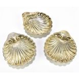 RICHARD RICHARDSON; a pair of George V hallmarked silver shell form butter dishes, Sheffield 1910,