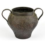 A 17th/18th century Dutch embossed copper twin handled wine cooler, height 24cm.