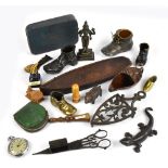 A group of collectors' items including brass boots, a figure of a gecko and a brass figure of an